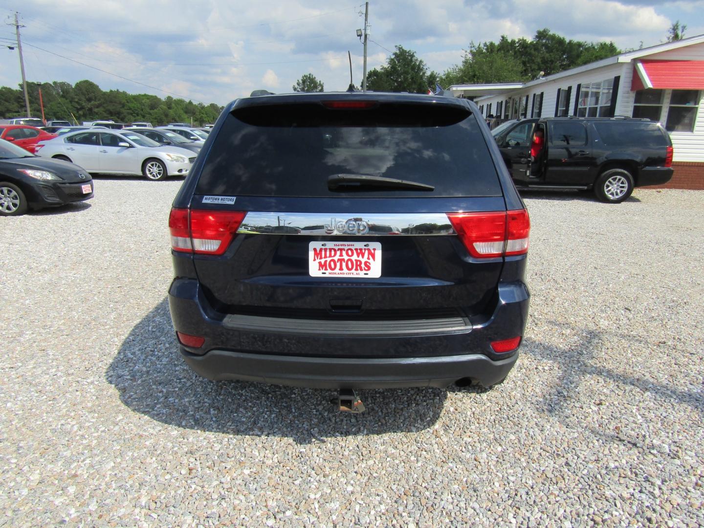 2013 Blue /Tan Jeep Grand Cherokee Laredo 2WD (1C4RJEAG1DC) with an 3.6L V6 DOHC 24V engine, Automatic transmission, located at 15016 S Hwy 231, Midland City, AL, 36350, (334) 983-3001, 31.306210, -85.495277 - Photo#6
